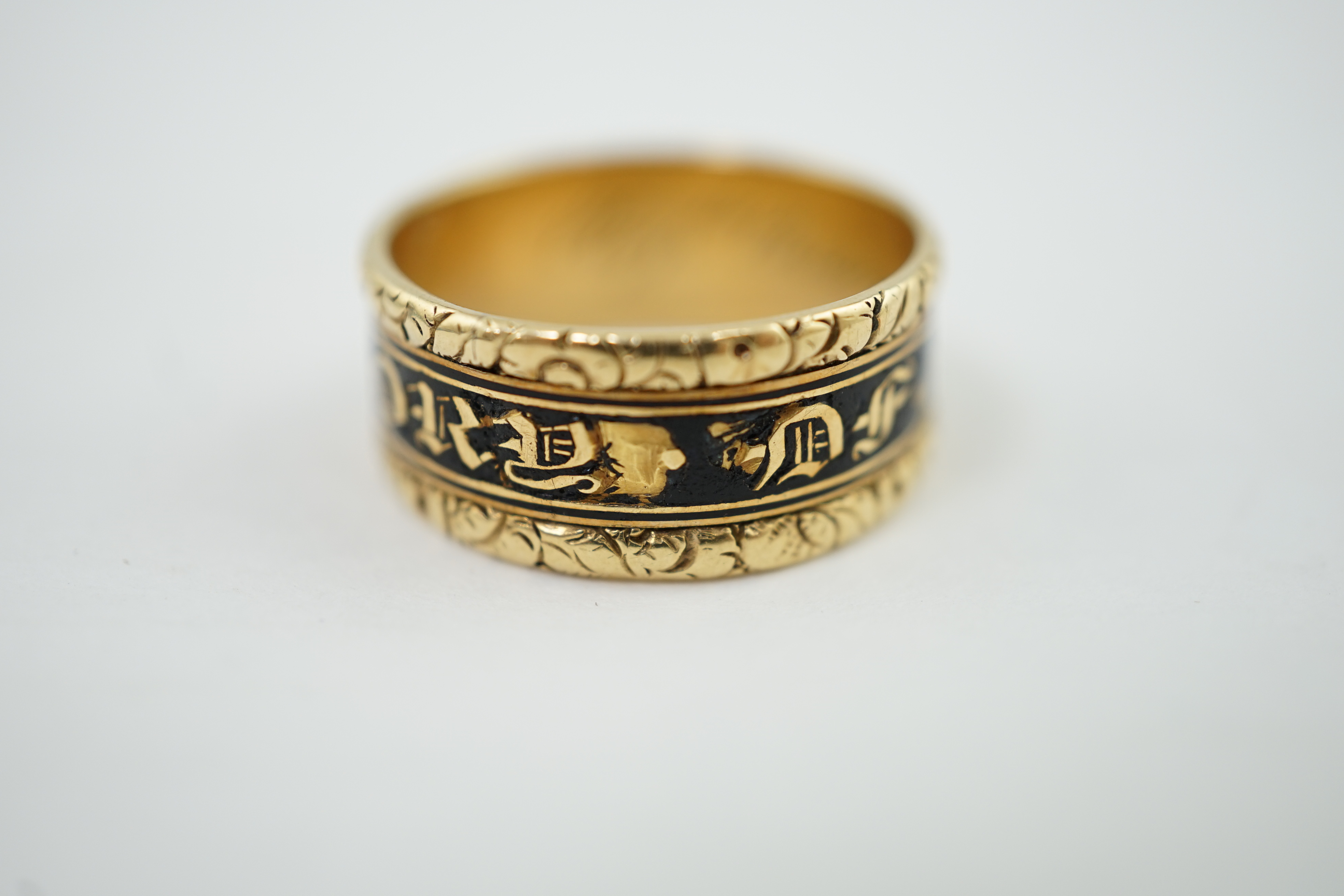 A George IV gold and black enamel mourning band